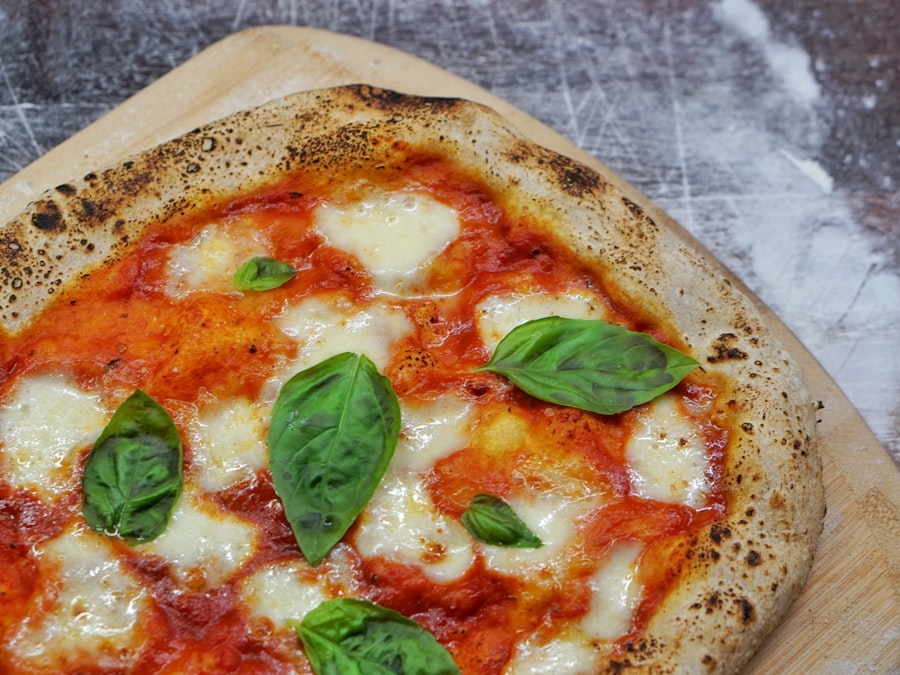 Bufala pizza with mozzarella and basil on a charred crust